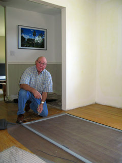 Grandpa Installing Window Screens